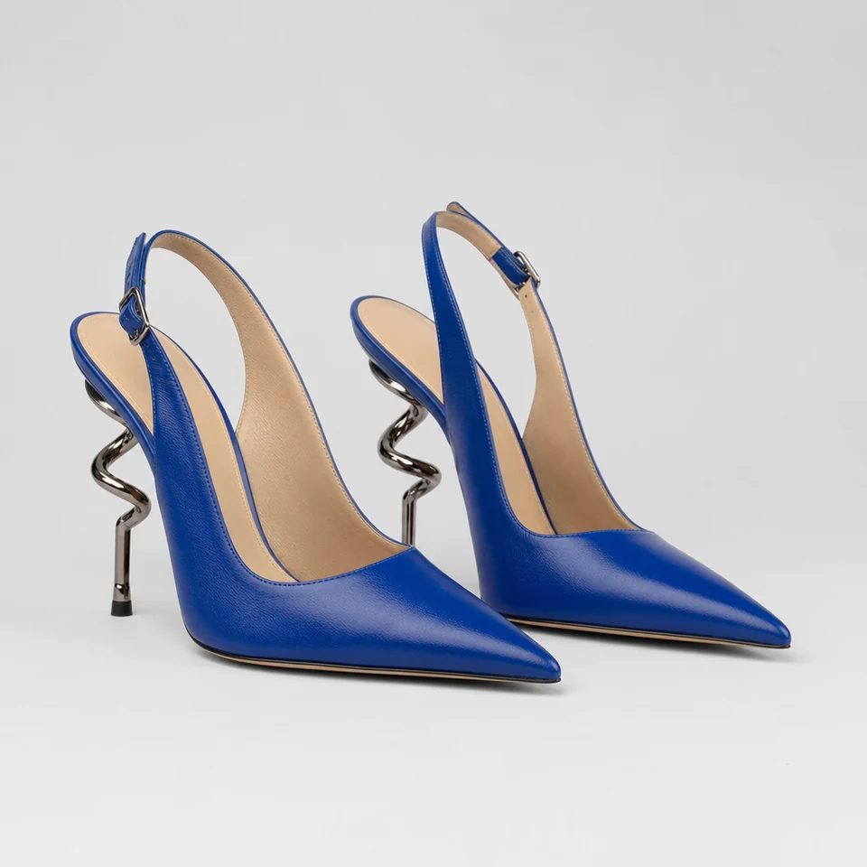 Pair of cobalt-blue glossy slingback pumps with pointed toe and sculptural spiral metal stiletto heels