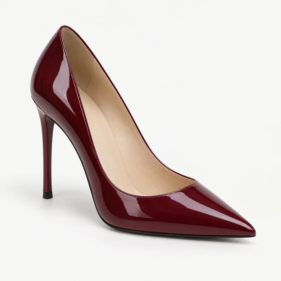 Glossy red patent-look pump with pointed toe and high stiletto heel