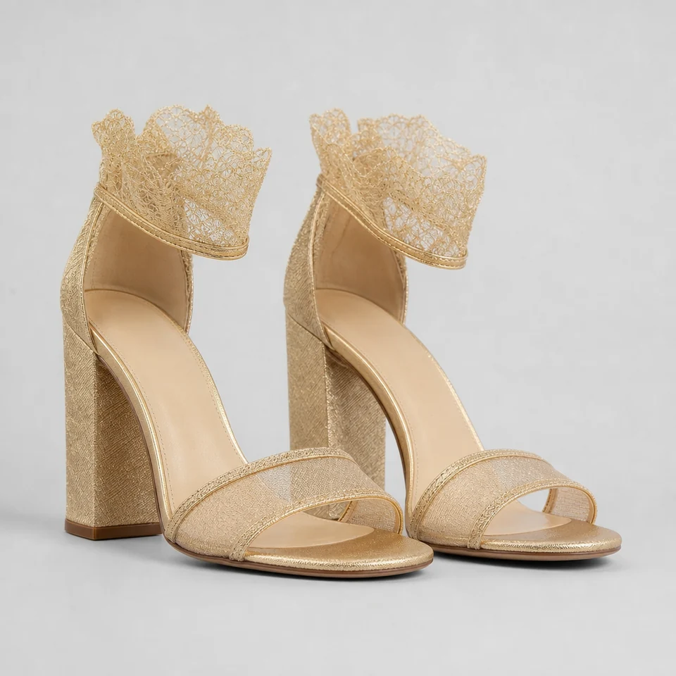 Gold high block heel sandal with open toe, mesh strap and lace detail around the ankle