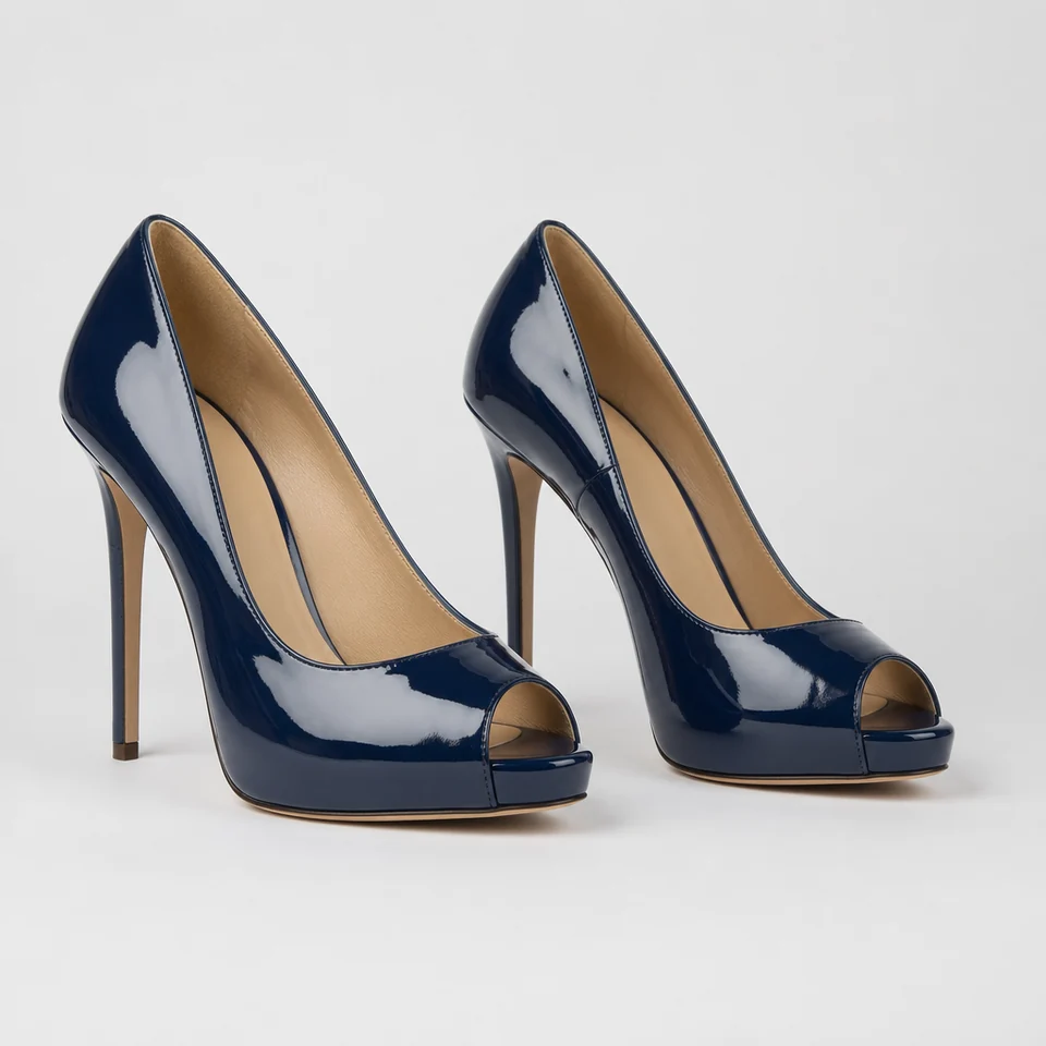 Glossy navy patent-look peep-toe stiletto pumps with high slender heels and subtle platform
